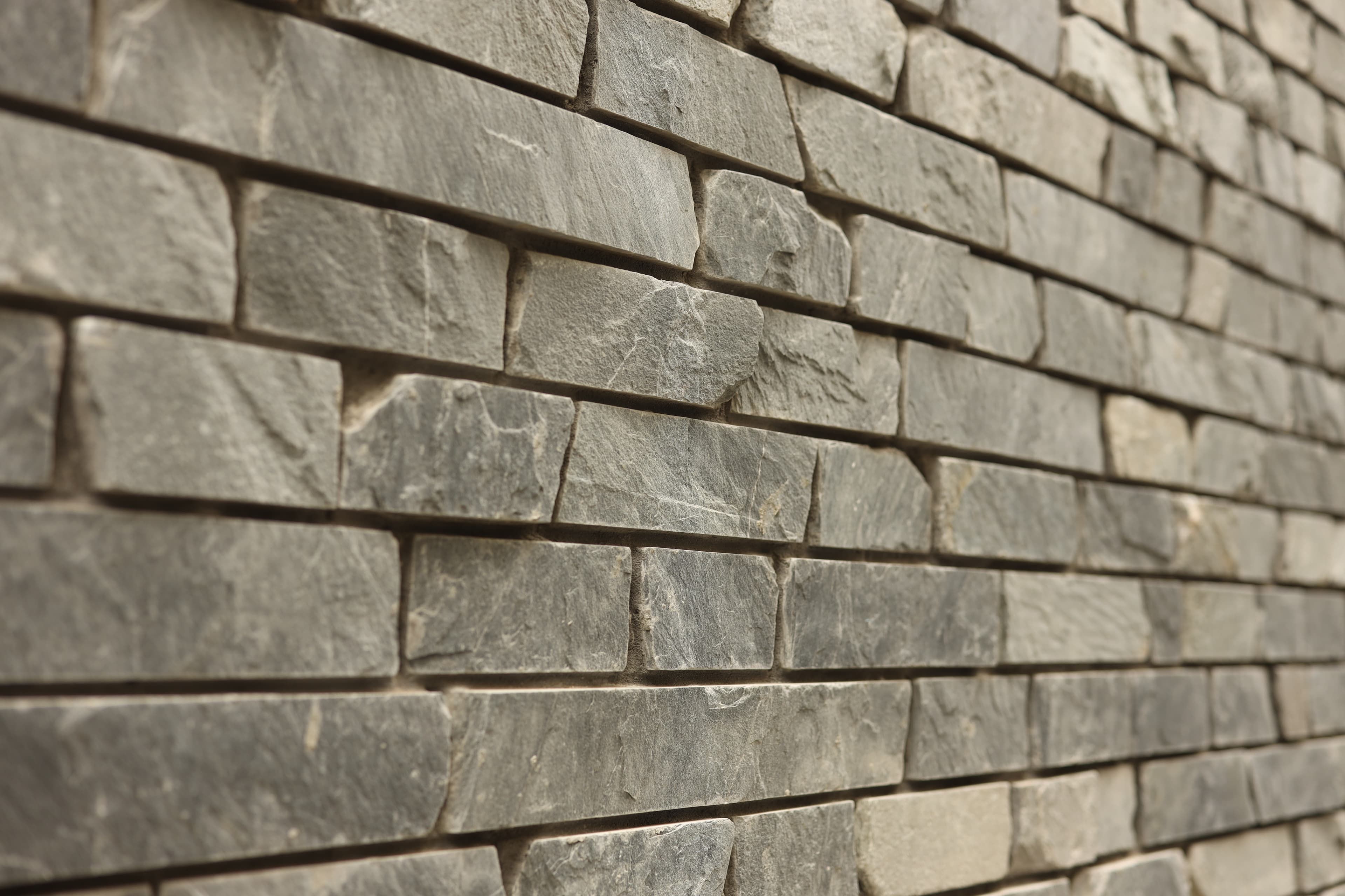 Stacked stone veneer wall in perspective